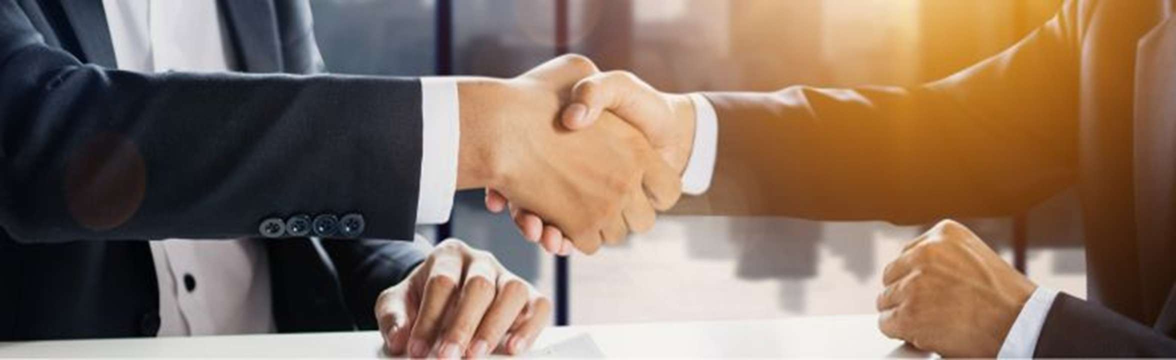 shaking hands hero banner